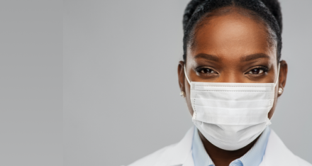Female researcher wearing a surgical mask